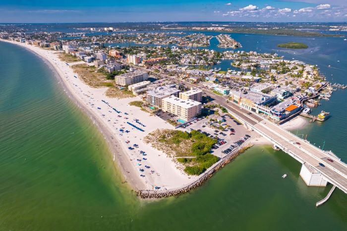An aerial view of John's Pass, a popular hang out on the north end of Treasure Island Beach. Numerous bars and restaurants, a beach, and other attractions are featured.